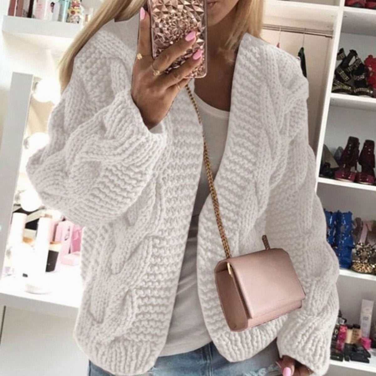 Oversized openvallend grofgebreid damesvest met kabelpatroon