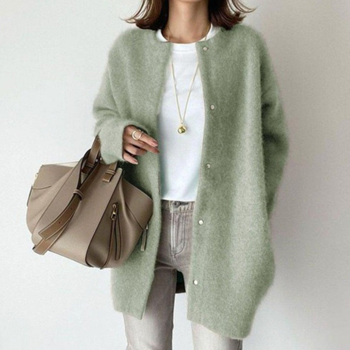 Oversized pluizig gebreid wintervest voor dames met knoopsluiting