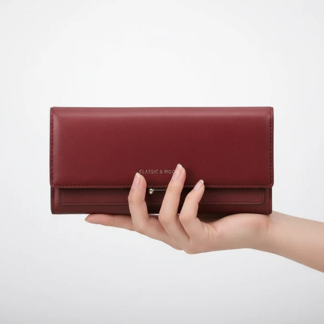 Ruime damesportemonnee met telefoonvak en elegante details