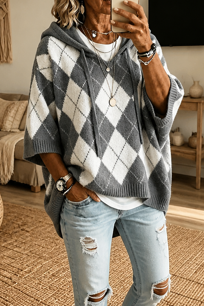 Argyle ponchotrui met capuchon en vleermuismouwen