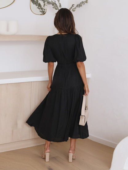 Dames midi-jurk met V-hals en pofmouwen
