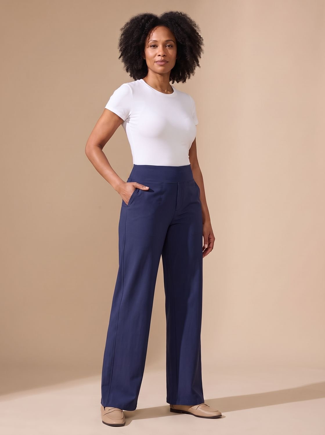 Damesbroek met wijde pijpen, hoge taille, stretch en zakken