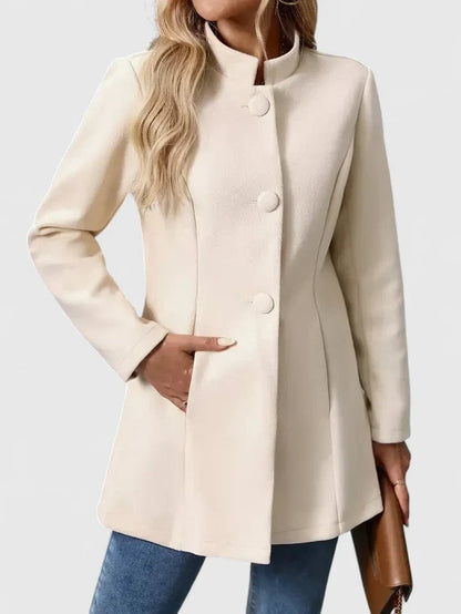 Elegante damesjas met opstaande kraag en knoopsluiting