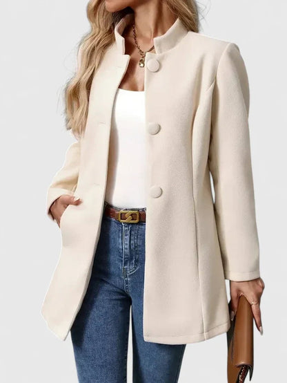 Elegante damesjas met opstaande kraag en knoopsluiting