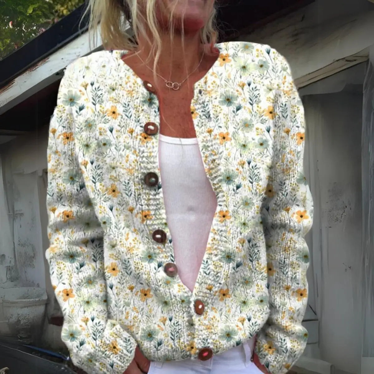 Gebreid damesvest met bloemenprint en knoopsluiting