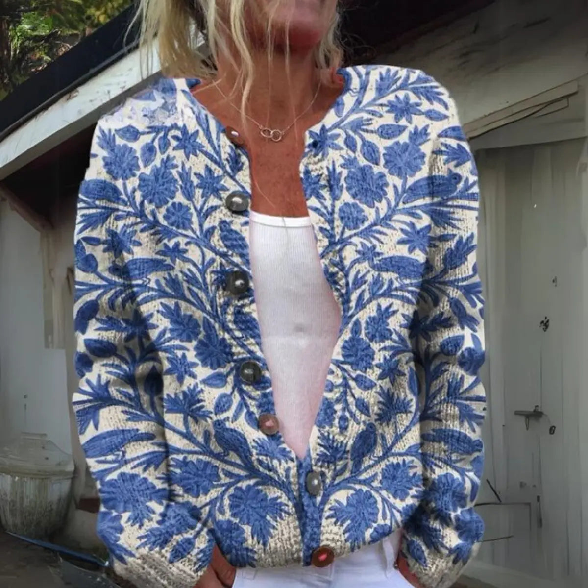 Gebreid damesvest met bloemenprint en knoopsluiting