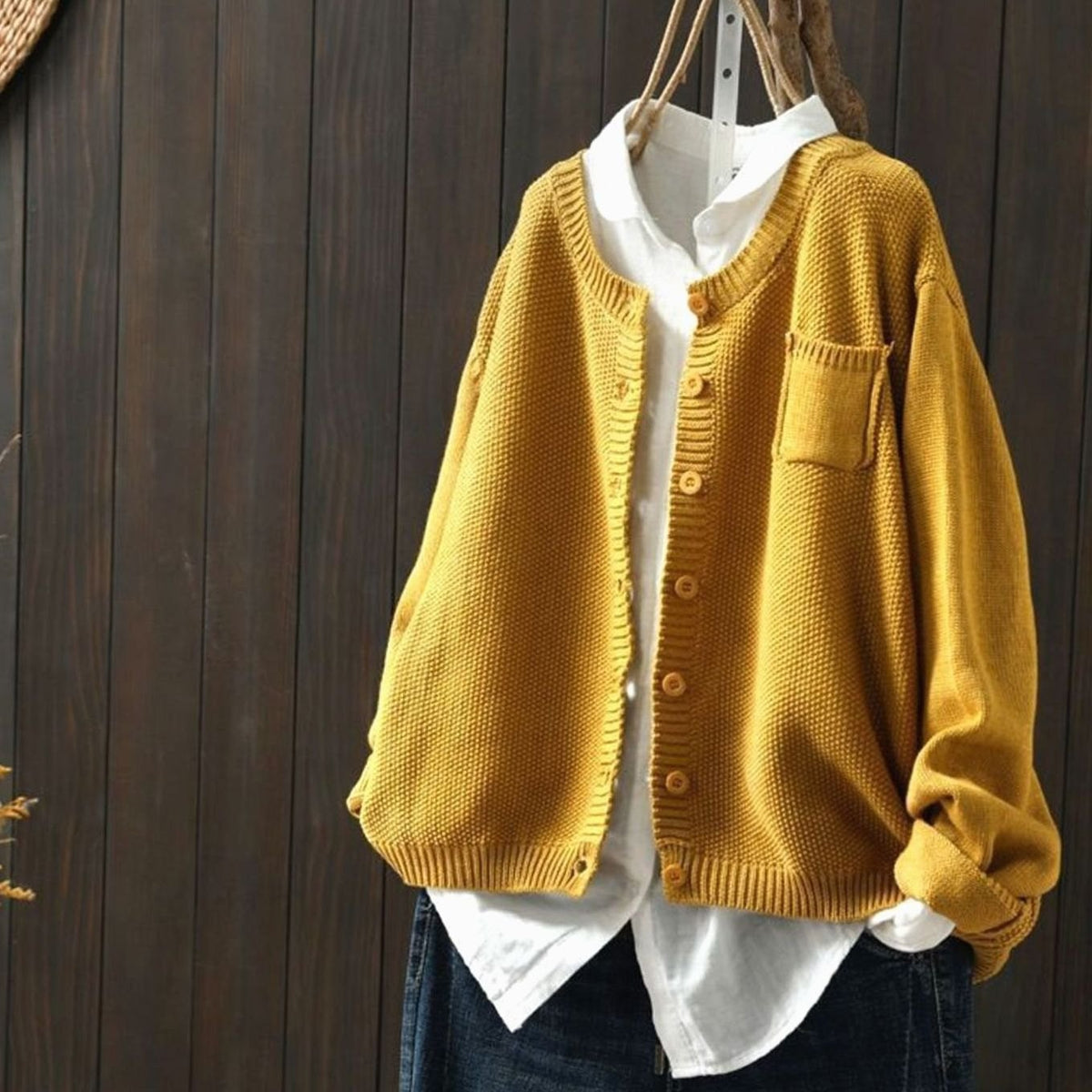 Gebreid damesvest met knoopsluiting en relaxte pasvorm