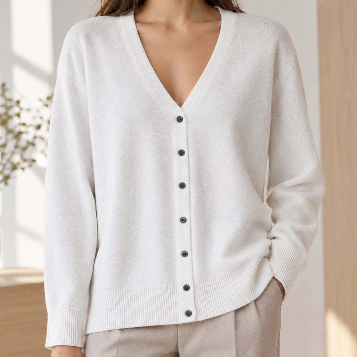 Gebreid damesvest met V-hals en knoopsluiting - relaxed fit