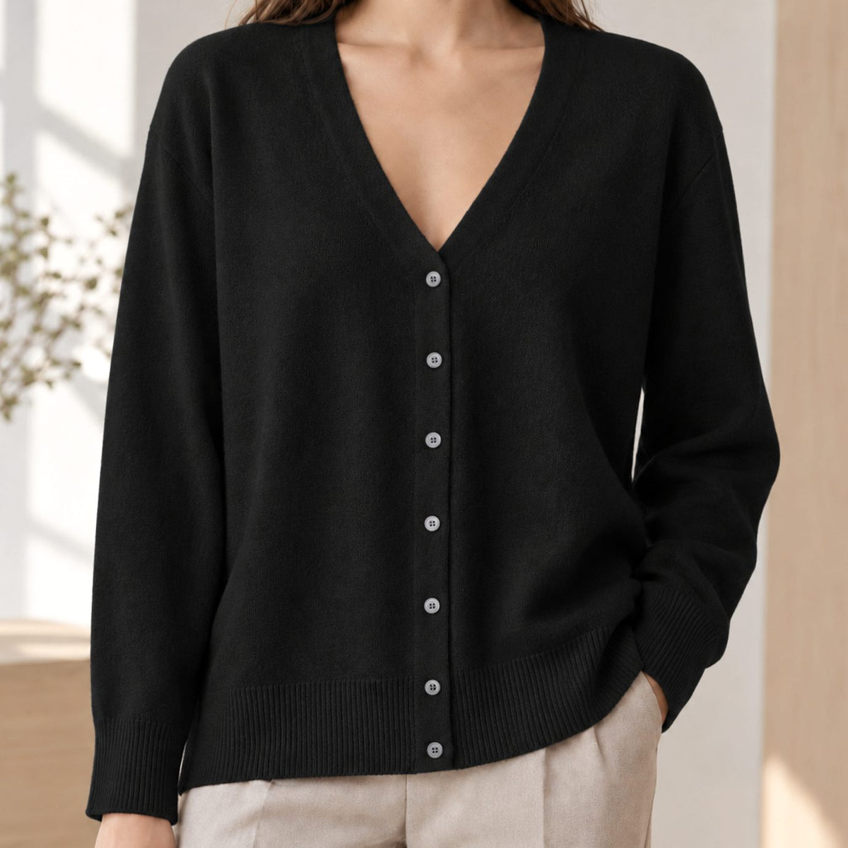 Gebreid damesvest met V-hals en knoopsluiting - relaxed fit