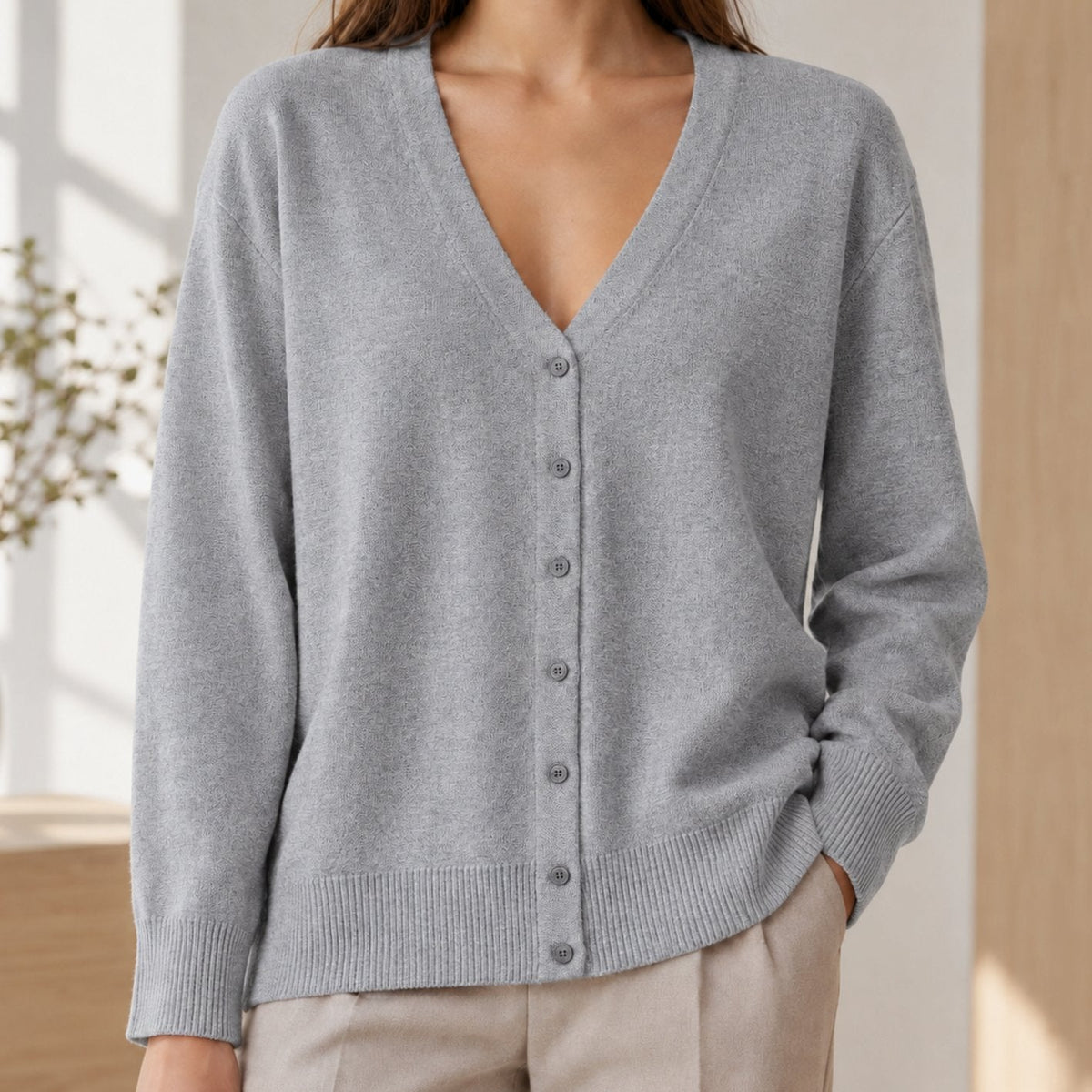 Gebreid damesvest met V-hals en knoopsluiting - relaxed fit