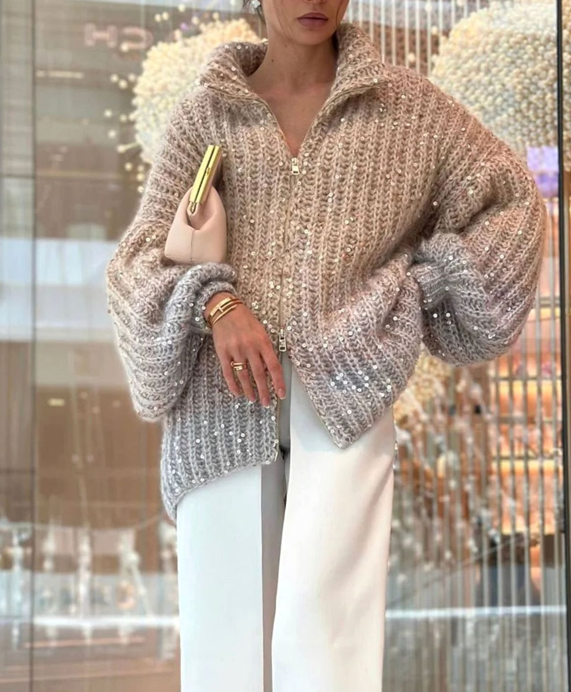 Grofgebreid oversized damesvest met ritskraag en pailletten