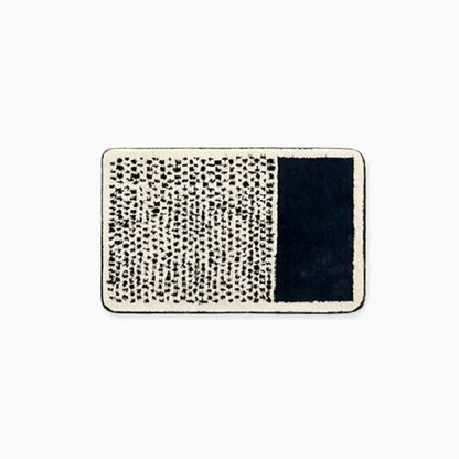 Handgemaakte badmat met abstract design