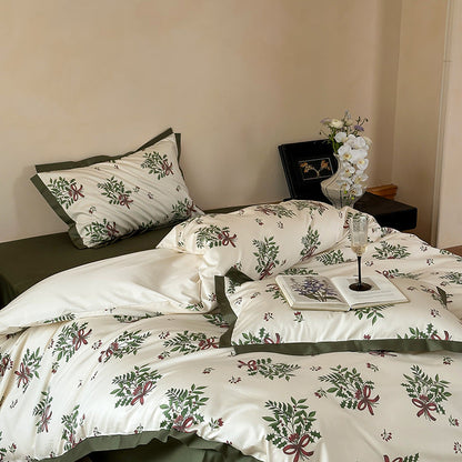 Katoensatijnen beddengoedset met bloemenkransen, hotelsluiting en contrasterende zoom