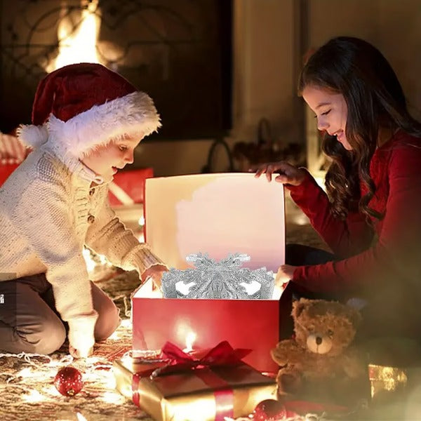 Kerstboompiek met verlichting en led-sneeuwvlokprojector