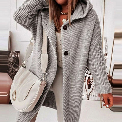 Lang gebreid wintervest met capuchon voor dames