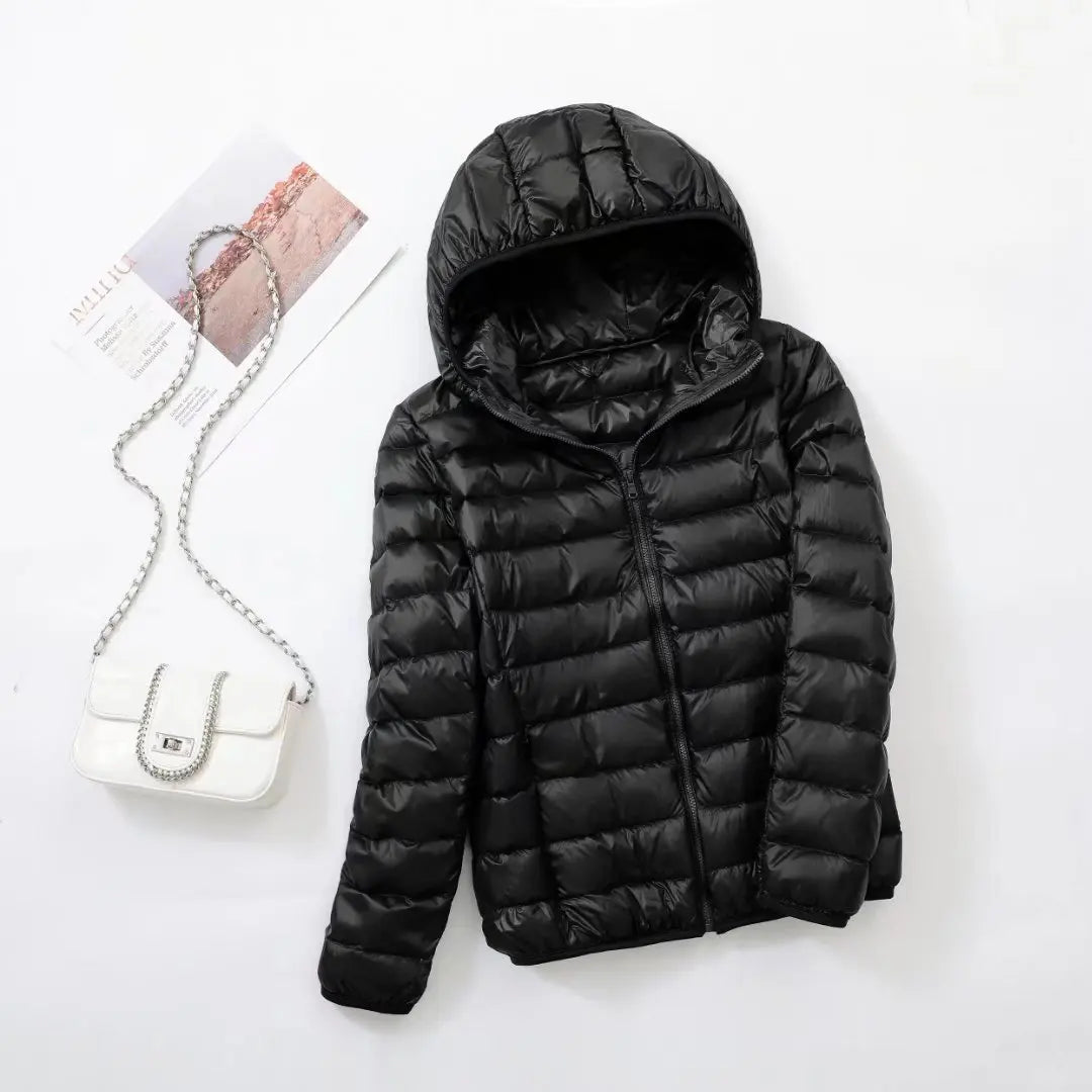 Omkeerbare donsjas voor dames met getailleerd silhouet
