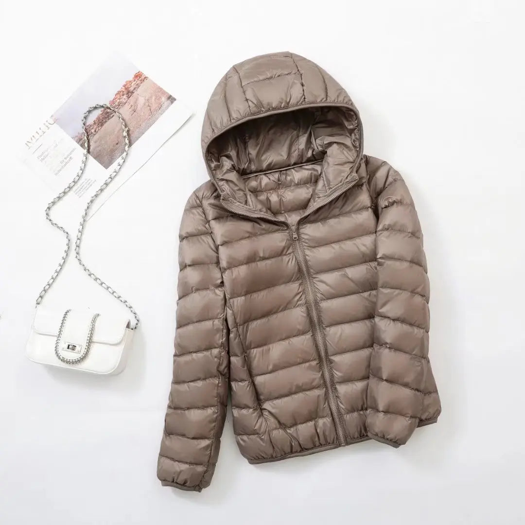 Omkeerbare donsjas voor dames met getailleerd silhouet