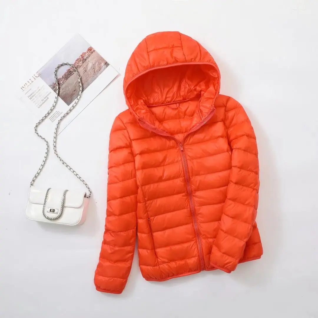 Omkeerbare donsjas voor dames met getailleerd silhouet