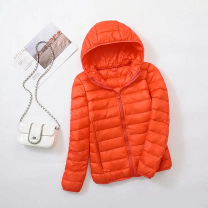 Omkeerbare donsjas voor dames met getailleerd silhouet