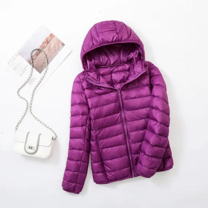 Omkeerbare donsjas voor dames met getailleerd silhouet