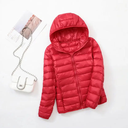 Omkeerbare donsjas voor dames met getailleerd silhouet