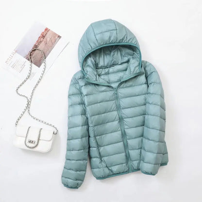 Omkeerbare donsjas voor dames met getailleerd silhouet