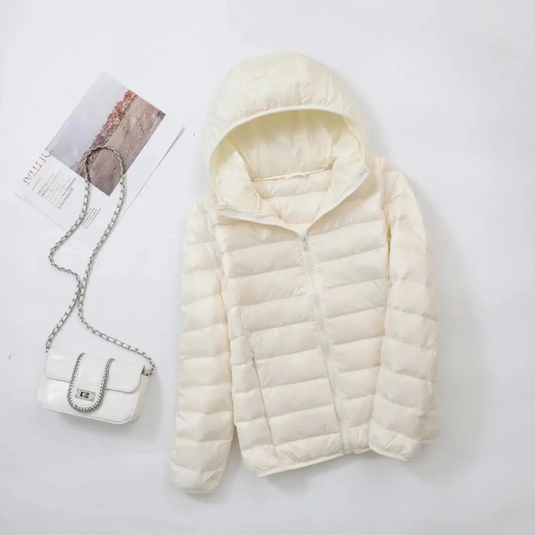 Omkeerbare donsjas voor dames met getailleerd silhouet