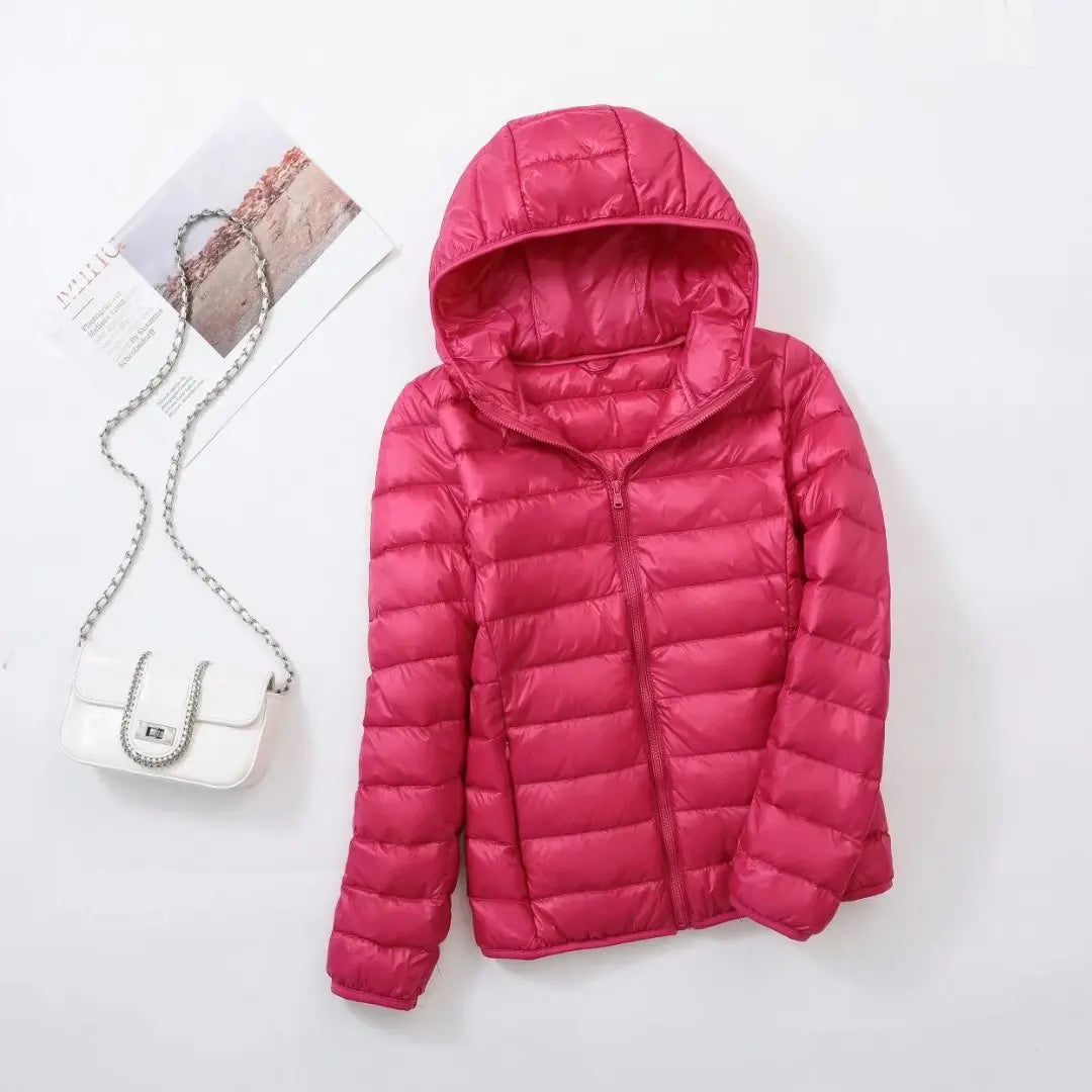 Omkeerbare donsjas voor dames met getailleerd silhouet