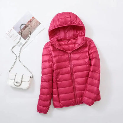 Omkeerbare donsjas voor dames met getailleerd silhouet