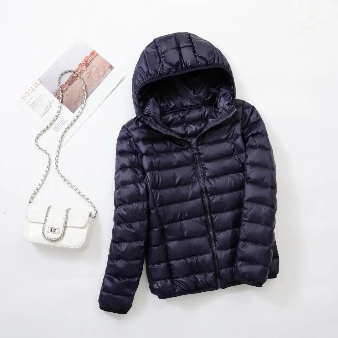Omkeerbare donsjas voor dames met getailleerd silhouet
