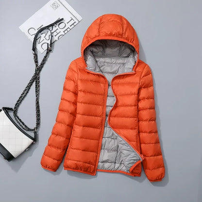 Omkeerbare donsjas voor dames met getailleerd silhouet