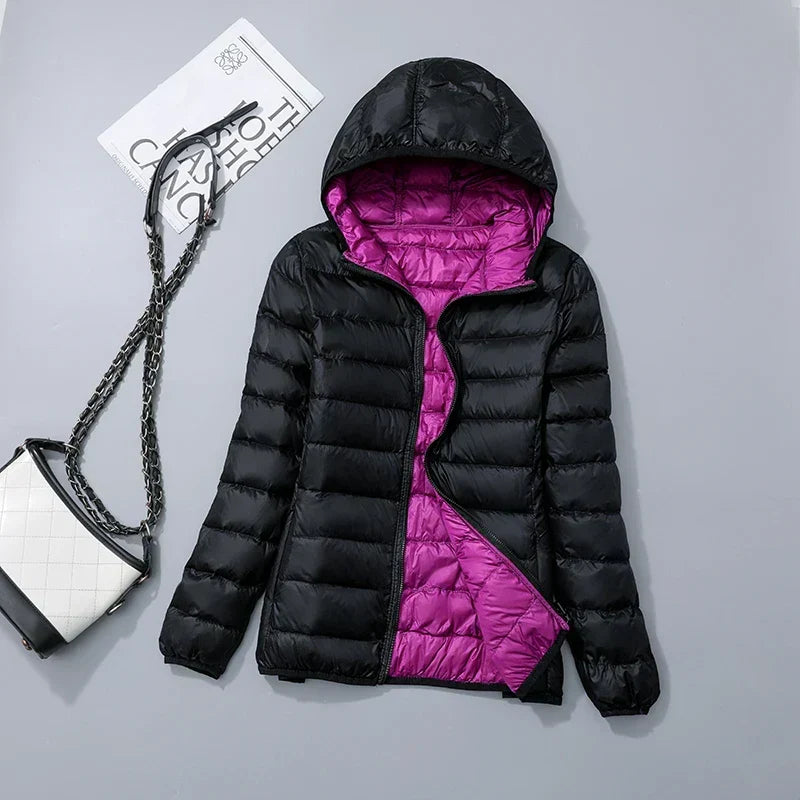 Omkeerbare donsjas voor dames met getailleerd silhouet