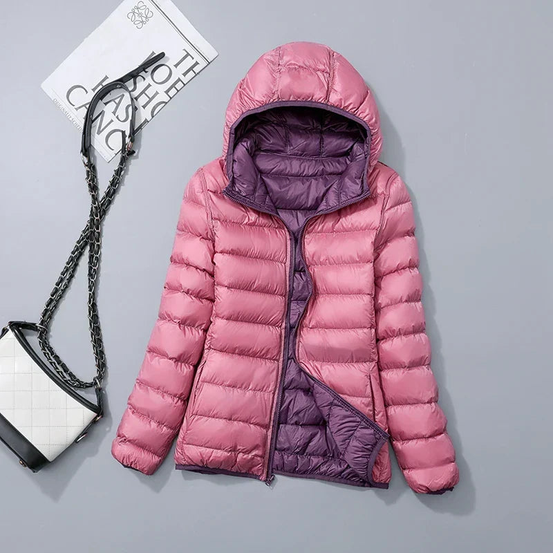 Omkeerbare donsjas voor dames met getailleerd silhouet