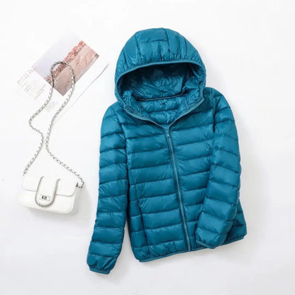 Omkeerbare donsjas voor dames met getailleerd silhouet