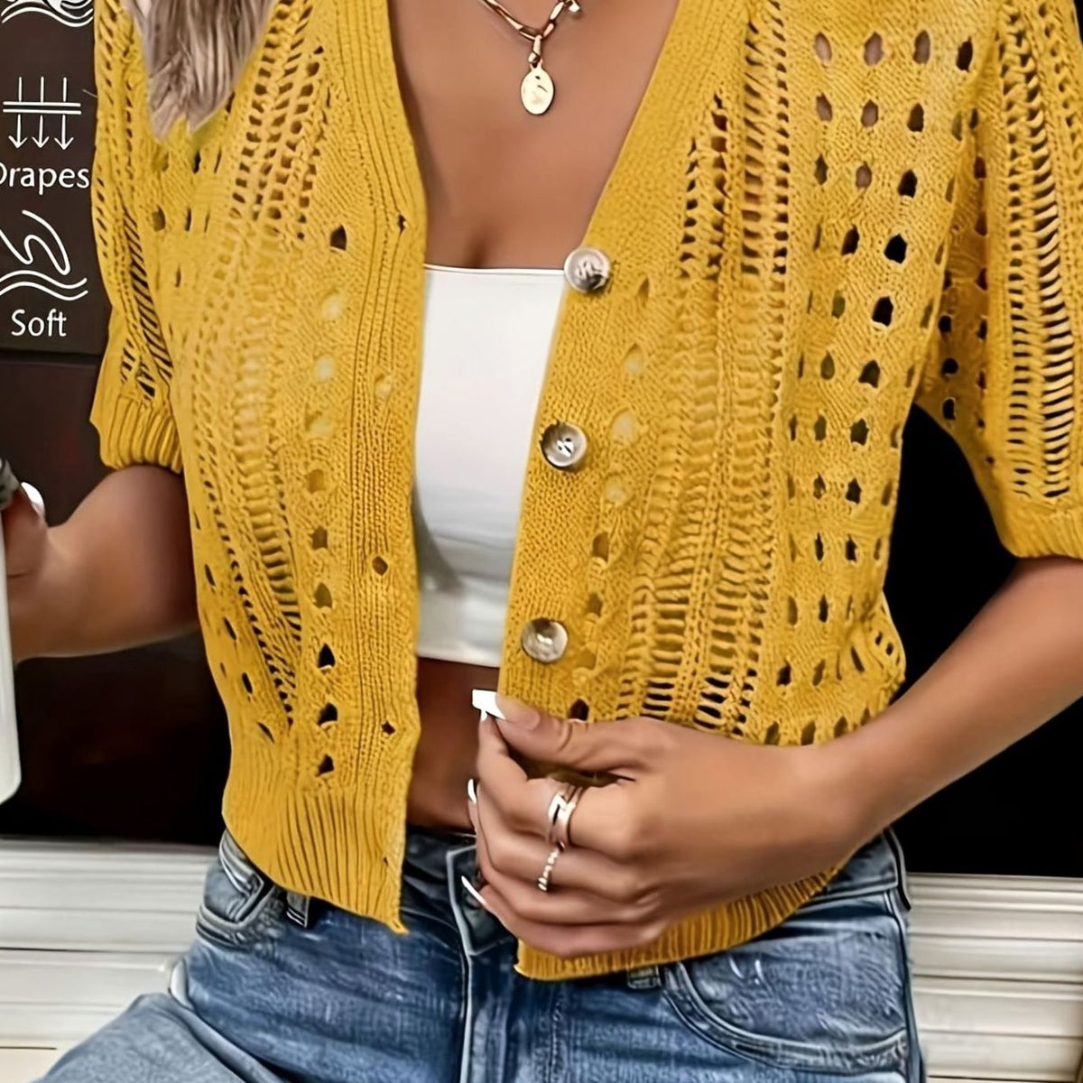 Opengewerkt cropped damesvest met korte mouwen en knopen