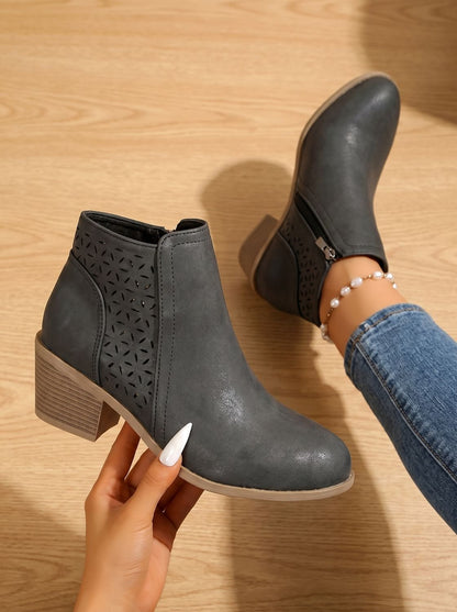 Orthopedische damesenkellaarsjes met blokhak en laser-cut motief