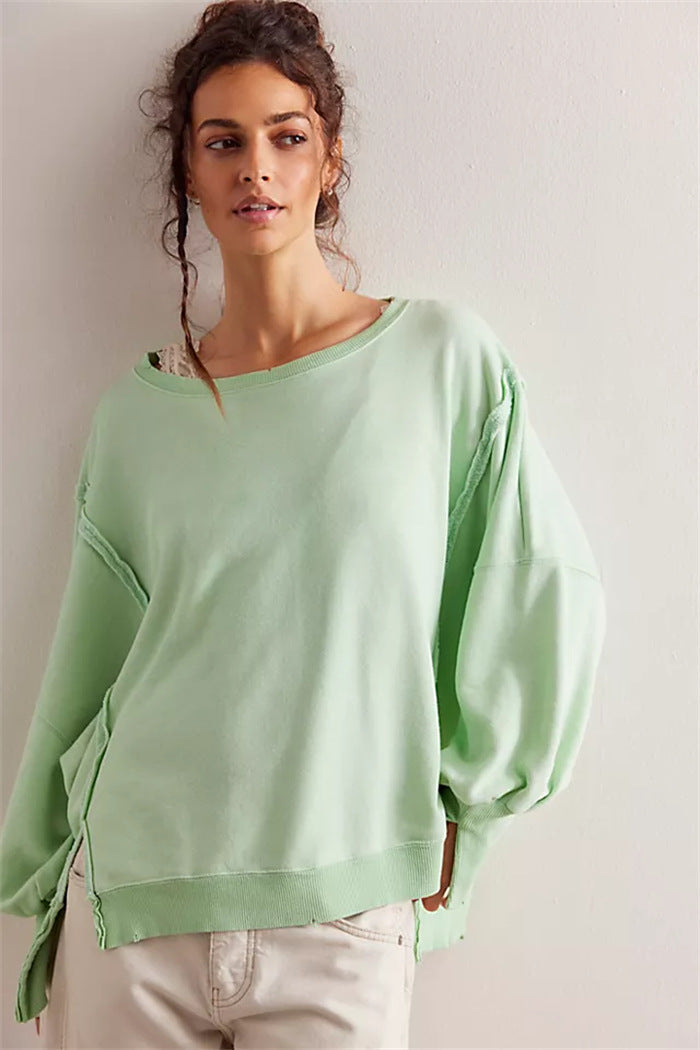 Oversized dames sweatshirt met ballonmouwen, open naden en zijspleten