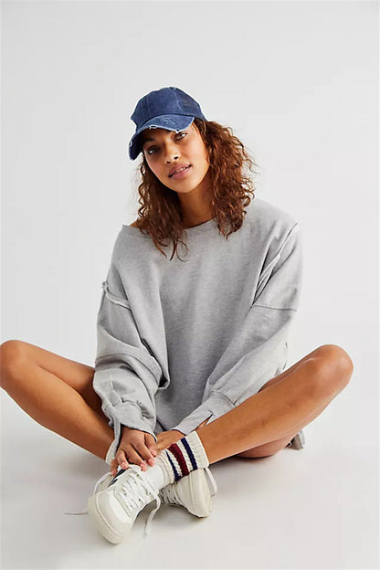 Oversized dames sweatshirt met ballonmouwen, open naden en zijspleten