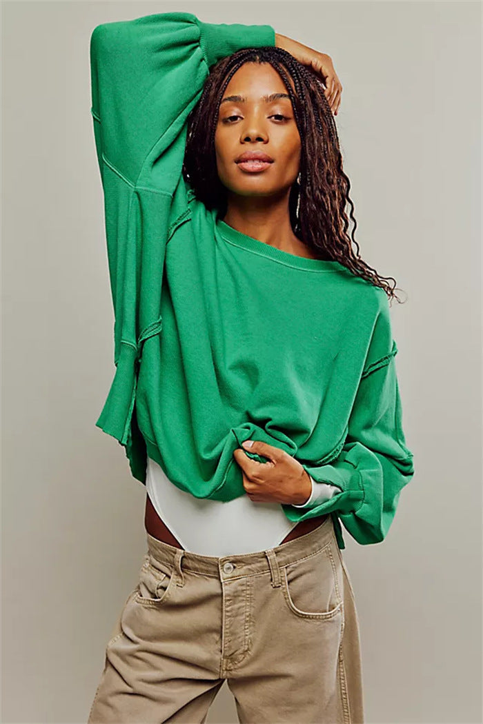 Oversized dames sweatshirt met ballonmouwen, open naden en zijspleten