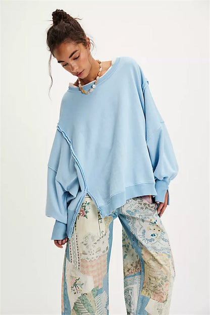 Oversized dames sweatshirt met ballonmouwen, open naden en zijspleten
