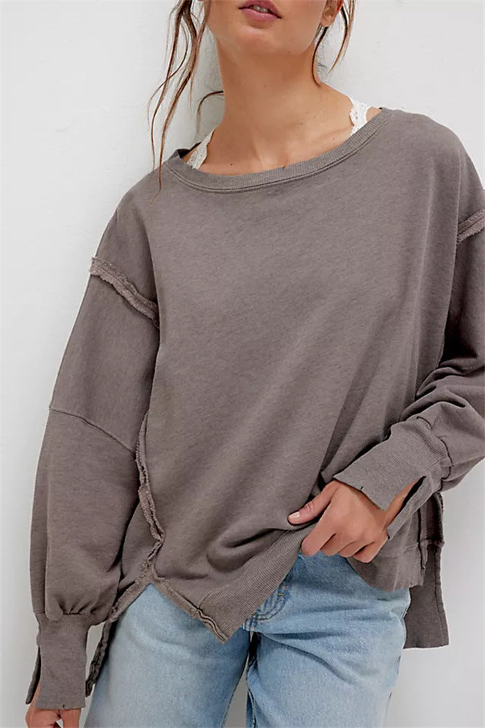 Oversized dames sweatshirt met ballonmouwen, open naden en zijspleten