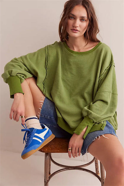 Oversized dames sweatshirt met ballonmouwen, open naden en zijspleten