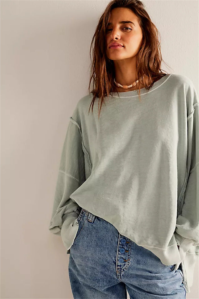 Oversized dames sweatshirt met ballonmouwen, open naden en zijspleten