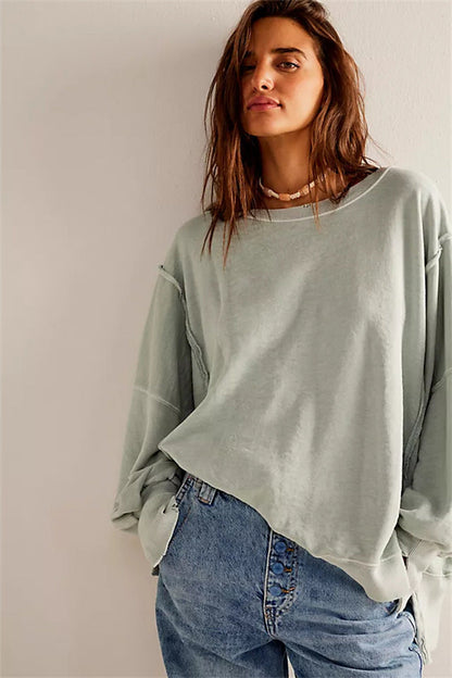 Oversized dames sweatshirt met ballonmouwen, open naden en zijspleten