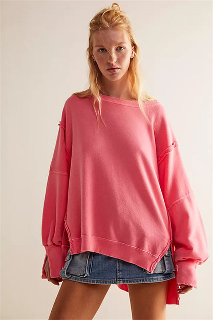 Oversized dames sweatshirt met ballonmouwen, open naden en zijspleten