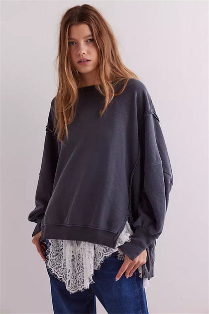Oversized dames sweatshirt met ballonmouwen, open naden en zijspleten