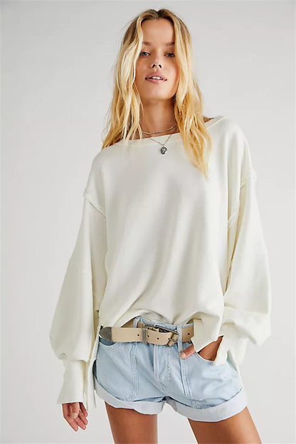 Oversized dames sweatshirt met ballonmouwen, open naden en zijspleten