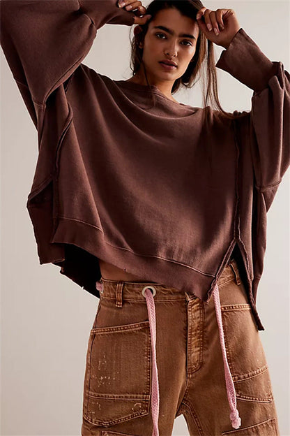 Oversized dames sweatshirt met ballonmouwen, open naden en zijspleten