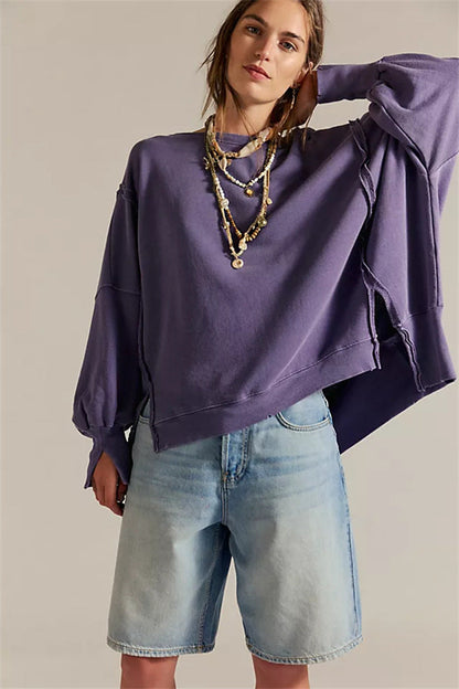 Oversized dames sweatshirt met ballonmouwen, open naden en zijspleten