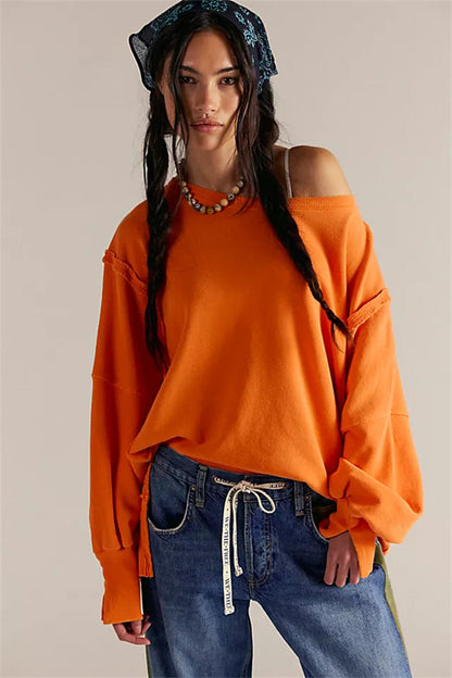 Oversized dames sweatshirt met ballonmouwen, open naden en zijspleten